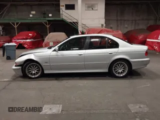 2003 BMW 5 Series 530iA with VIN WBADT63483CK43601, listed as a IAAI auction lot 41808414 with 132,050 mi miles. Bid and sale history available at carsss.com. Image 14.