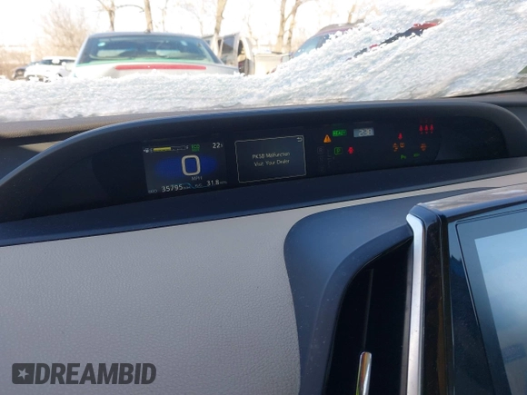 2021 Toyota Prius L Eco with VIN JTDKAMFU9M3135117, listed as a IAAI auction lot 41579736 with 35,795 mi miles and . Bid and sale history available at DreamBid. Image 7.