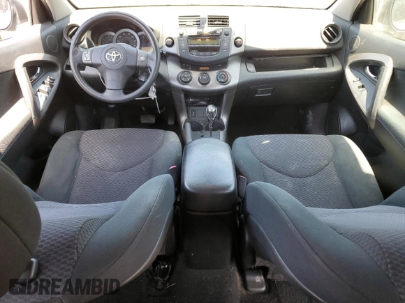 2010 Toyota RAV4 Sport with VIN JTMWF4DVXA5028981, listed as a Copart auction lot 60931165 with 214,075 mi miles and Salvage title. Bid and sale history available at DreamBid. Image 8.