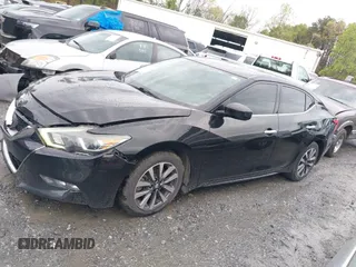 2016 Nissan Maxima SV z VIN 1N4AA6AP6GC400496, wystawiony jako IAAI lot #41908190 z przebiegiem 149 984 mil mil oraz . Historia ofert i sprzedaży dostępna na DreamBid. Obrazek 14.