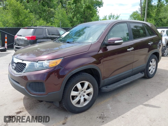 2012 Kia Sorento LX z VIN 5XYKT3A19CG286034, wystawiony jako IAAI lot #42269635 z przebiegiem 163 935 mil mil oraz . Historia ofert i sprzedaży dostępna na DreamBid. Obrazek 2.