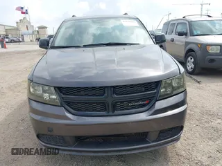 2019 Dodge Journey SE with VIN 3C4PDCBBXKT860142, listed as a IAAI auction lot 42126997 with 101,675 mi miles and . Bid and sale history available at DreamBid. Image 12.