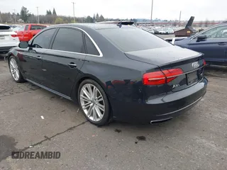 2017 Audi A8 L Sport with VIN WAU43AFD1HN007334, listed as a IAAI auction lot 41760035 with 67,342 mi miles. Bid and sale history available at carsss.com. Image 3.