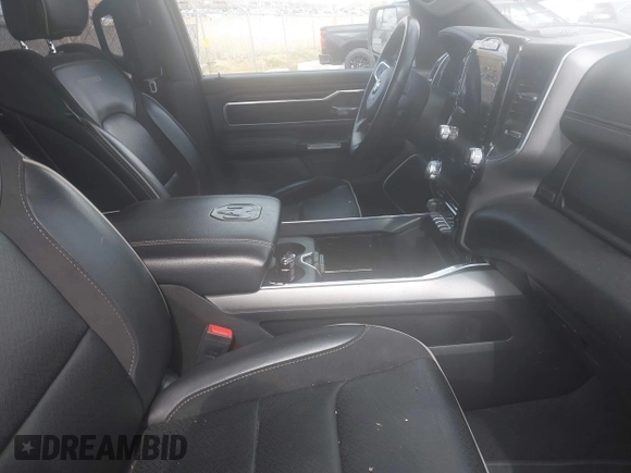 2023 Ram 1500 Laramie with VIN 1C6SRFJT3PN541901, listed as a IAAI auction lot 42156766 with 58,082 mi miles and . Bid and sale history available at DreamBid. Image 5.