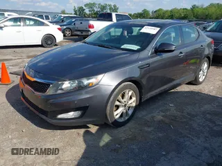2011 Kia Optima EX with VIN KNAGN4A7XB5060289, listed as a IAAI auction lot 42149987 with 174,243 mi miles and . Bid and sale history available at carsss.com. Image 2.