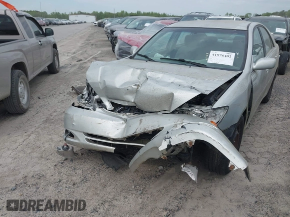 2003 Toyota Camry LE with VIN 4T1BE32K63U755835, listed as a IAAI auction lot 41976402 with 215,788 mi miles and . Bid and sale history available at DreamBid. Image 17.