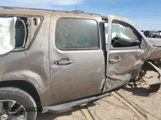2014 Chevrolet Suburban LT with VIN 1GNSCJE01ER226363, listed as a Copart auction lot 50534915 with 185,731 mi miles and Salvage Title. Bid and sale history available at carsss.com. Image 12.