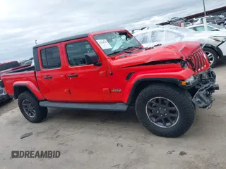 2022 Jeep Gladiator High Altitude with VIN 1C6HJTFG0NL105043, listed as a IAAI auction lot 41290790 with 73,595 mi miles and . Bid and sale history available at DreamBid. Image 14.