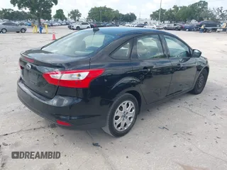 2012 Ford Focus SE с VIN 1FAHP3F25CL221093, выставлен на аукционе IAAI как лот 42318758 с пробегом 129 563 миль миль и . История ставок и продаж доступна на DreamBid. Изображение 4.