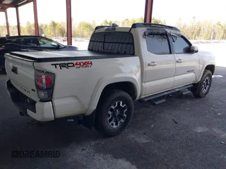 2021 Toyota Tacoma SR z VIN 3TYCZ5AN4MT048876, wystawiony jako IAAI lot #41802975 z przebiegiem 27 816 mil mil oraz . Historia ofert i sprzedaży dostępna na DreamBid. Obrazek 4.