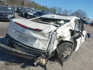 2012 Cadillac CTS Premium with VIN 1G6DS5E36C0139035, listed as a IAAI auction lot 41775266 with 176,370 mi miles and . Bid and sale history available at DreamBid. Image 4.
