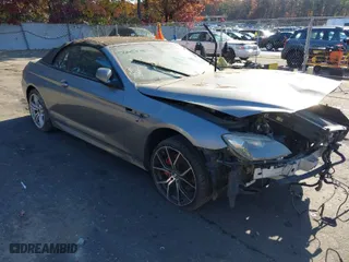 2015 BMW M6 with VIN WBSLZ9C57FD651313, listed as a IAAI auction lot 37867051 with 45,132 mi miles. Bid and sale history available at carsss.com. Image 1.