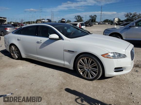 2013 Jaguar XJ Supercharged with VIN SAJWA2GE3DMV45811, listed as a Copart auction lot 76585864 with 53,570 mi miles and Salvage title. Bid and sale history available at DreamBid. Image 4.