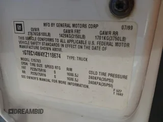 2000 GMC New Sierra 1500 SLE with VIN 1GTEC14W4YZ118674, listed as a IAAI auction lot 41726001 with 169,858 mi miles. Bid and sale history available at carsss.com. Image 9.