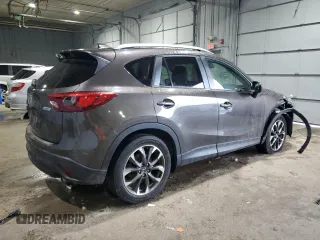 2016 Mazda CX-5 Grand Touring with VIN JM3KE4DY0G0765406, listed as a Copart auction lot 46499385 with 116,155 mi miles and Salvage Title. Bid and sale history available at carsss.com. Image 3.