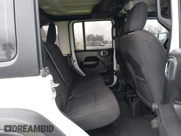 2023 Jeep Wrangler Sport S with VIN 1C4HJXDG0PW638871, listed as a IAAI auction lot 42129295 with 16,171 mi miles and . Bid and sale history available at DreamBid. Image 8.