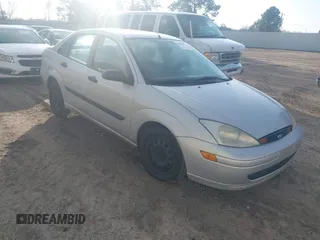 2001 Ford Focus LX with VIN 1FAFP33P21W309425, listed as a IAAI auction lot 41482071 with 86,943 mi miles and . Bid and sale history available at carsss.com. Image 1.
