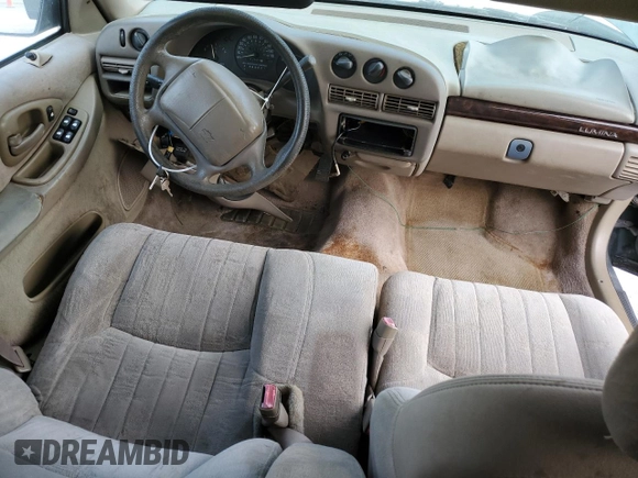 1997 Chevrolet Lumina LS with VIN 2G1WL52M1V9120300, listed as a Copart auction lot 87460394 with 142,588 mi miles and Salvage Title. Bid and sale history available at DreamBid. Image 8.