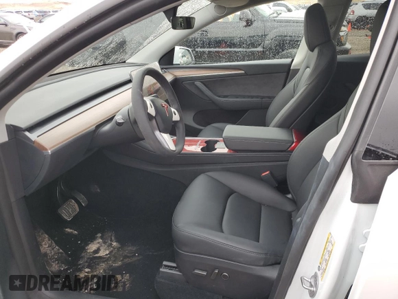 2024 Tesla Model Y Long Range with VIN 7SAYGAEE1RF061318, listed as a Copart auction lot 81142444 with 3,249 mi miles and Salvage Title. Bid and sale history available at DreamBid. Image 7.
