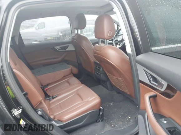 2019 Audi Q7 Premium with VIN WA1AHAF74KD029904, listed as a IAAI auction lot 41024012 with 79,896 mi miles and . Bid and sale history available at DreamBid. Image 8.