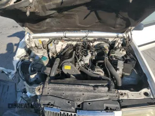 1994 Volvo 900 z VIN YV1JS8611R1172830, wystawiony jako Copart lot #75955284 z przebiegiem 222 846 mil mil oraz Szkody całkowita. Historia ofert i sprzedaży dostępna na DreamBid. Obrazek 13.