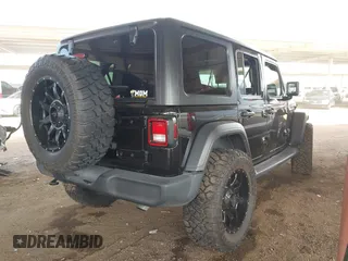 2019 Jeep Wrangler Unlimited Sport S with VIN 1C4HJXDN2KW630780, listed as a IAAI auction lot 41817573 with 56,113 mi miles. Bid and sale history available at carsss.com. Image 4.