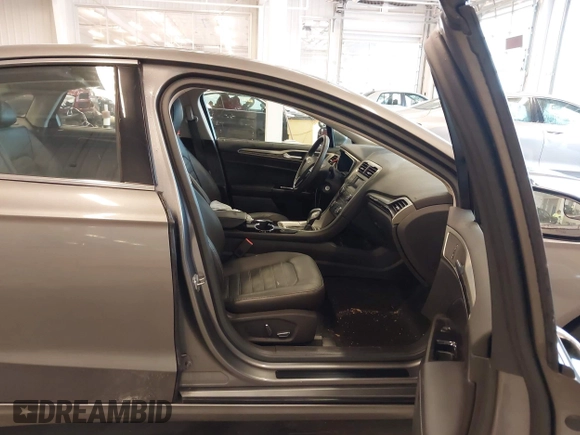 2014 Ford Fusion SE Hybrid with VIN 3FA6P0LU5ER310629, listed as a IAAI auction lot 41941852 with 53,739 mi miles. Bid and sale history available at carsss.com. Image 5.