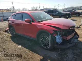 2023 Mazda CX-5 2.5 S Premium Package with VIN JM3KFBDM2P0193740, listed as a Copart auction lot 47616605 with 29,979 mi miles and Salvage Title. Bid and sale history available at carsss.com. Image 4.