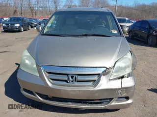 2006 Honda Odyssey EX-L z VIN 5FNRL38736B069969, wystawiony jako IAAI lot #41695311 z przebiegiem 196 218 mil mil oraz . Historia ofert i sprzedaży dostępna na DreamBid. Obrazek 12.