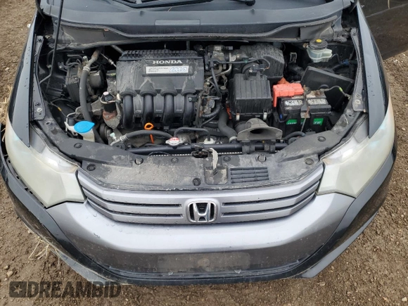 2010 Honda Insight LX with VIN JHMZE2H56AS022299, listed as a Copart auction lot 54872215 with 149,514 mi miles and Salvage title. Bid and sale history available at DreamBid. Image 11.