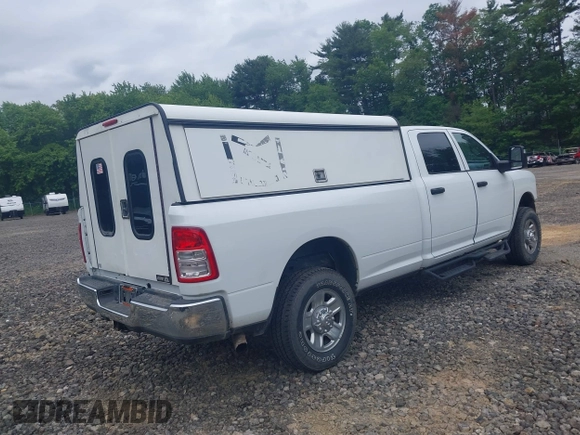 2024 Ram 2500 Tradesman with VIN 3C6UR5HJ8RG288173, listed as a IAAI auction lot 42290610 with 5,757 mi miles and . Bid and sale history available at DreamBid. Image 4.