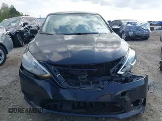 2018 Nissan Sentra S with VIN 3N1AB7AP5JY211272, listed as a IAAI auction lot 41941030 with 264,501 mi miles and . Bid and sale history available at DreamBid. Image 12.