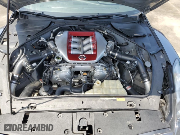 2010 Nissan GT-R Premium с VIN JN1AR5EF3AM231377, выставлен на аукционе Copart как лот 52572685 с пробегом 55 879 миль миль и Списание • Salvage title. История ставок и продаж доступна на DreamBid. Изображение 11.