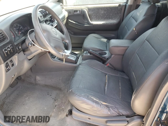 2001 Isuzu Rodeo S z VIN 4S2DM58W014344342, wystawiony jako Copart lot #60161365 z przebiegiem Nie podano mil oraz Czysty tytuł • Clean title. Historia ofert i sprzedaży dostępna na DreamBid. Obrazek 7.