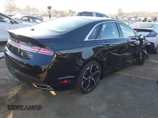 2016 Lincoln MKZ Hybrid z VIN 3LN6L2LU1GR612760, wystawiony jako IAAI lot #41752860 z przebiegiem 101 795 mil mil oraz . Historia ofert i sprzedaży dostępna na DreamBid. Obrazek 4.