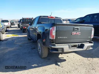 2016 GMC Canyon 2WD SLT with VIN 1GTG5DE35G1102893, listed as a IAAI auction lot 41798727 with 151,166 mi miles. Bid and sale history available at carsss.com. Image 3.