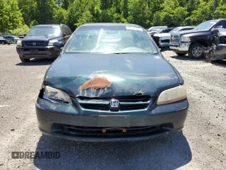 2000 Honda Accord EX с VIN 1HGCG1655YA034444, выставлен на аукционе Copart как лот 58974485 с пробегом 239 959 миль миль и Списание • Salvage title. История ставок и продаж доступна на DreamBid. Изображение 5.