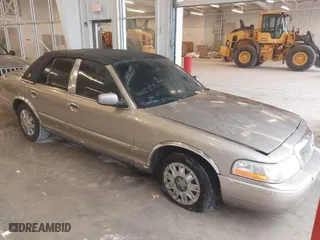 2005 Mercury Grand Marquis GS with VIN 2MEFM74W25X621219, listed as a IAAI auction lot 41552698 with 170,793 mi miles. Bid and sale history available at carsss.com. Image 1.