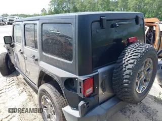 2016 Jeep Wrangler Unlimited Rubicon Hard Rock with VIN 1C4BJWFG6GL265320, listed as a IAAI auction lot 42260151 with Not provided miles and . Bid and sale history available at DreamBid. Image 3.