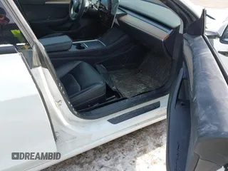 2022 Tesla Model 3 Long Range with VIN 5YJ3E1EB6NF114723, listed as a IAAI auction lot 41396258 with 2,179 mi miles and . Bid and sale history available at DreamBid. Image 5.