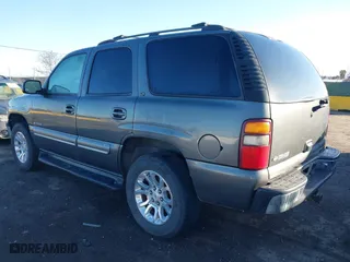 2001 Chevrolet Tahoe LT with VIN 1GNEC13T41J132352, listed as a IAAI auction lot 41490904 with 1 mi miles. Bid and sale history available at carsss.com. Image 3.