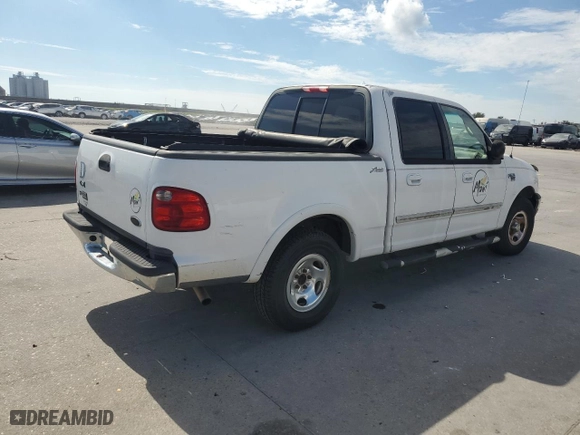 2001 Ford F-150 SuperCrew XLT with VIN 1FTRW07W41KE02772, listed as a Copart auction lot 73586724 with 0 mi miles and Salvage Title. Bid and sale history available at carsss.com. Image 3.