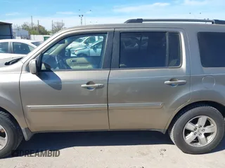 2010 Honda Pilot EX-L z VIN 5FNYF4H56AB001911, wystawiony jako IAAI lot #41806101 z przebiegiem 188 949 mil mil oraz . Historia ofert i sprzedaży dostępna na DreamBid. Obrazek 14.