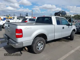 2007 Ford F-150 STX with VIN 1FTRX14W87KC40659, listed as a IAAI auction lot 41423345 with 145,811 mi miles. Bid and sale history available at carsss.com. Image 4.