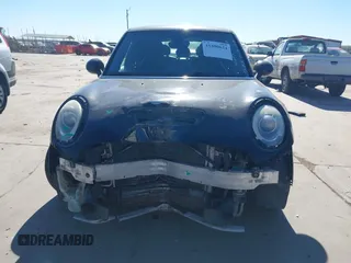 2015 MINI Hardtop 4 Door S with VIN WMWXU3C53F2B56459, listed as a IAAI auction lot 41400624 with 233,850 mi miles and . Bid and sale history available at DreamBid. Image 12.