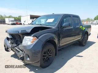 2014 Nissan Frontier SV with VIN 1N6AD0EV6EN729351, listed as a IAAI auction lot 42072768 with 149,158 mi miles and . Bid and sale history available at DreamBid. Image 2.