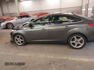 2013 Ford Focus Titanium with VIN 1FADP3J23DL265049, listed as a IAAI auction lot 41765621 with 100,550 mi miles and . Bid and sale history available at carsss.com. Image 14.
