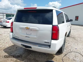 2018 Chevrolet Suburban Premier z VIN 1GNSKJKC6JR402075, wystawiony jako IAAI lot #42124796 z przebiegiem 156 900 mil mil oraz . Historia ofert i sprzedaży dostępna na DreamBid. Obrazek 4.