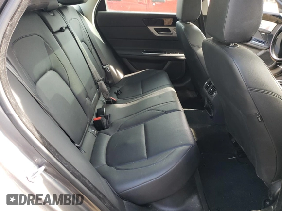 2017 Jaguar XF with VIN SAJBJ4BN2HCY51072, listed as a Copart auction lot 50466694 with 77,611 mi miles and . Bid and sale history available at DreamBid. Image 10.