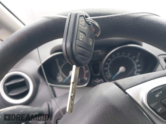 2018 Ford Fiesta SE z VIN 3FADP4BJXJM117051, wystawiony jako IAAI lot #42049956 z przebiegiem 27 367 mil mil oraz . Historia ofert i sprzedaży dostępna na DreamBid. Obrazek 11.